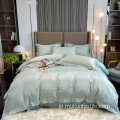 100年代の綿刺繍の寝具はクイーンサイズをセットします